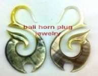 organic body piercing and body jewelry part. M.o.p sea shell tribal plugs