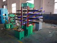 Rubber tile press