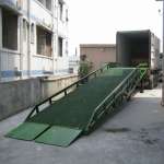 Movable dock leveler yard ramp