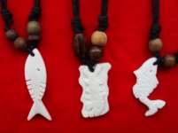 Hand Carved Pendants Of Fish