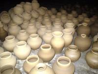 clay formed flower jars