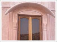 sandstone gate,  window and jharokha