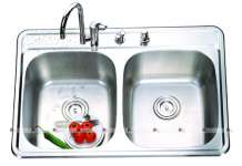 Undermount sink with 4 tap-holes