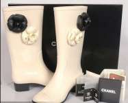 Chanel and Burberry Rain boots