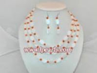 white oval shell jewelry set with orange shells