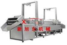 Continuous frying machines