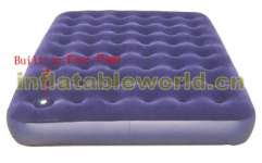 Air bed with built-in foot pump