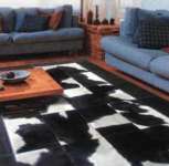 Stitiched hair on hides,  leather rugs